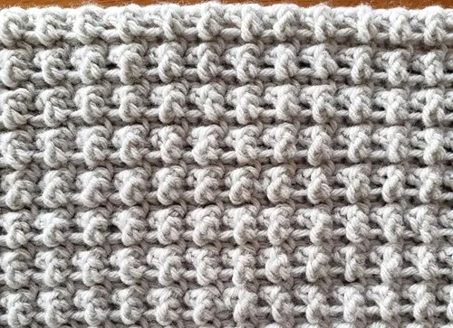 Up close of the textured crochet stitches.