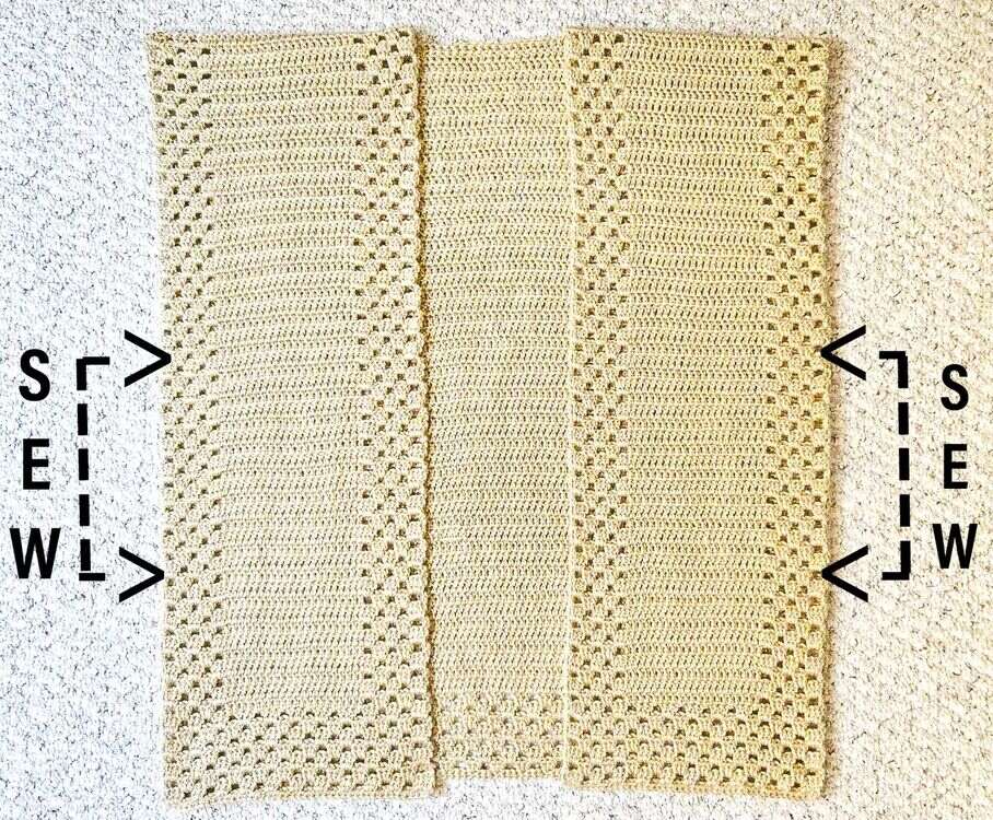 The ruana is laid flat on the floor and shows you how to sew the side seams.