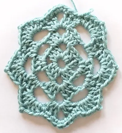 Round four of the crochet motif.